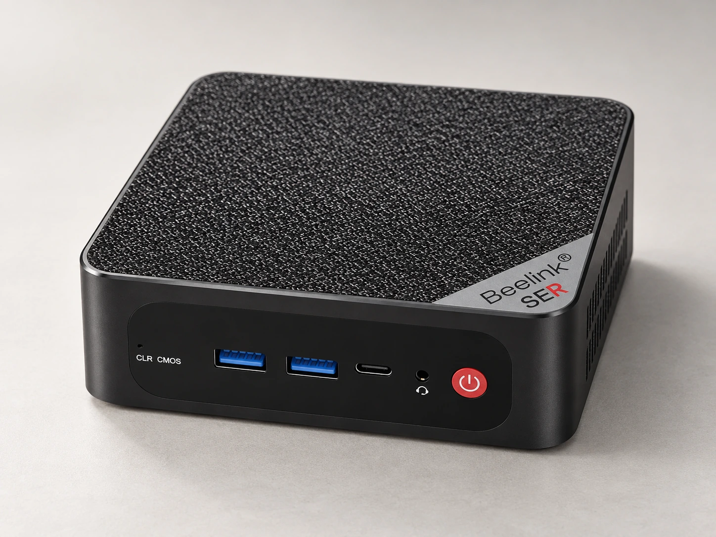 AI-generated studio portrait of Mini-PC + Batocera, SER5 MAX · Ryzen 7 5800H · 32 GB / 500 GB study.